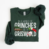 In A World Full Of Grinches Be A Griswold Shirt, Christmas Sweatshirt Tee